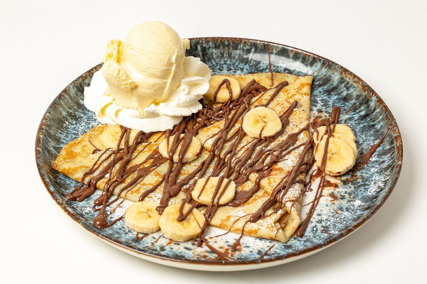 Crêpes mit Nutella, Banane und Eis